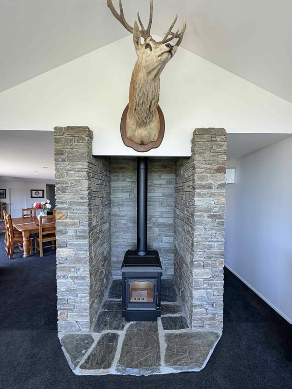 Double-sided stone fireplace clean and install